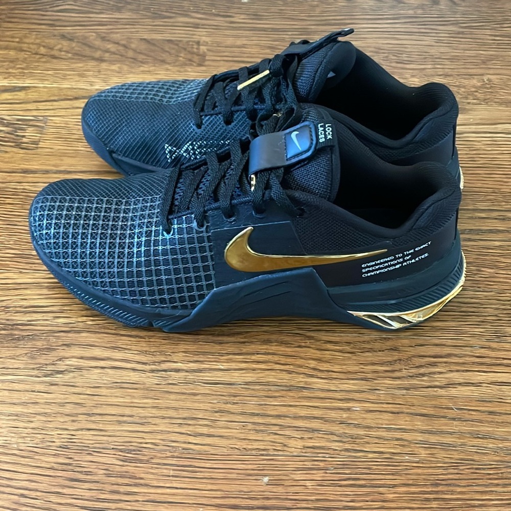 Black and gold Customized Nike women’s metcon 8 size 7.5